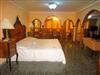 Villa Isis - One extra big bedroom with king bed, bathroom and living room